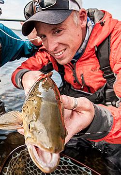 omar gade guide fishing sea trout fyn denmark fishing lodge fly fishing guide spin fishing guiding coast of funen